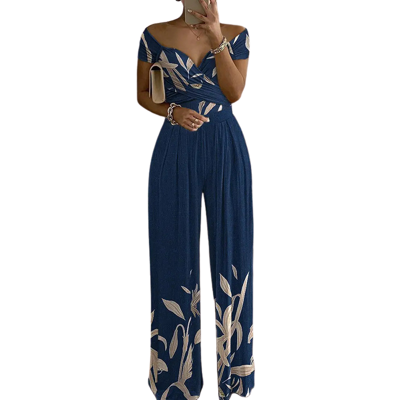 CHYNA™ – Blommig jumpsuit med bara axlar och omlott