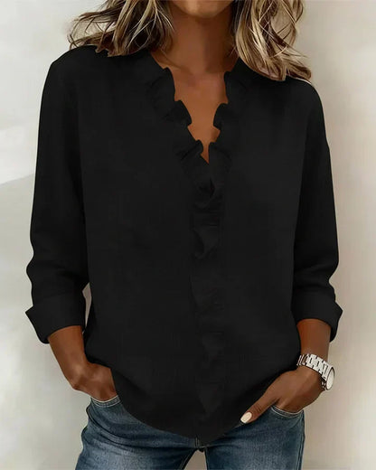 Delilah - Blus med volang och v-ringning