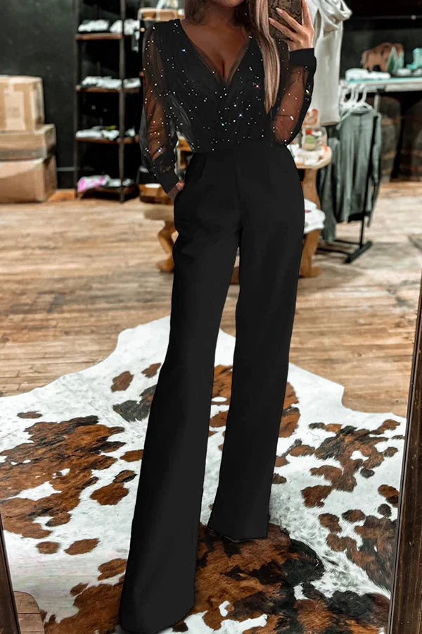 Islie | Jumpsuit med transparenta ärmar och vida ben
