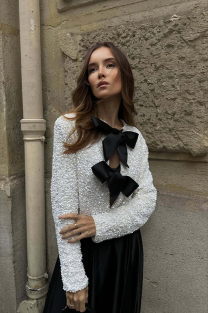 Anwen | Elegant blus med rosettdetalj