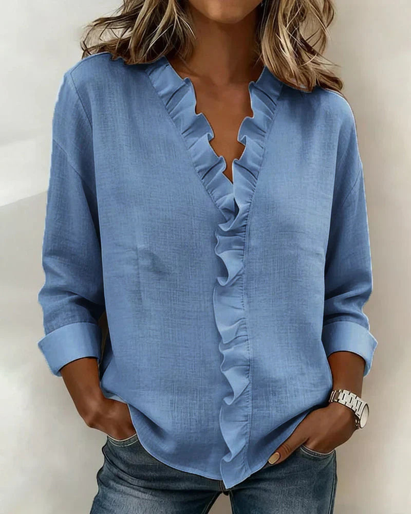 Delilah - Blus med volang och v-ringning