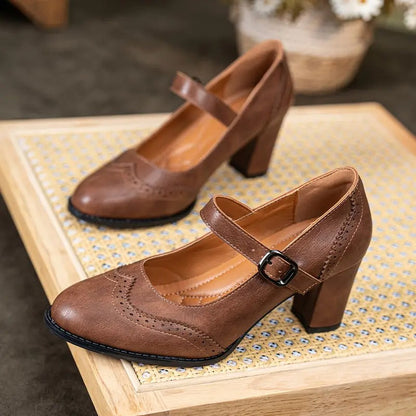 Dorka | Högklackade slip on med spänne