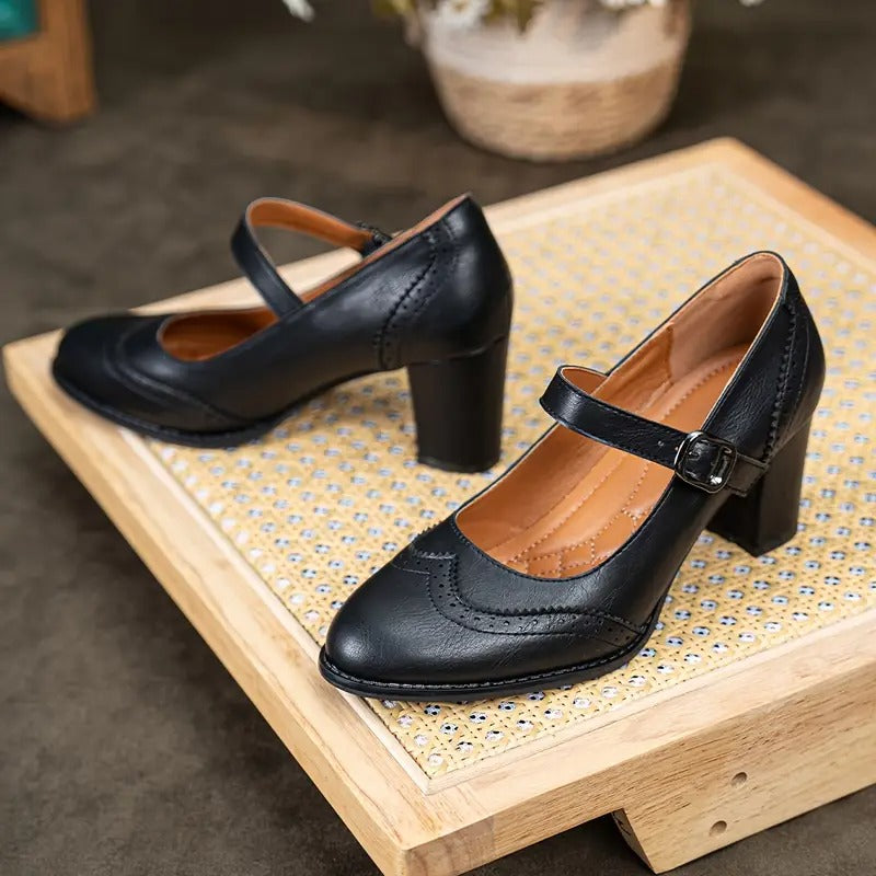 Dorka | Högklackade slip on med spänne